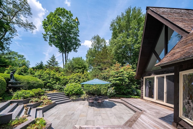 6 Tantummaheag Rd, Old Lyme, CT 06371 - wooden terrace with outdoor dining space and a patio area