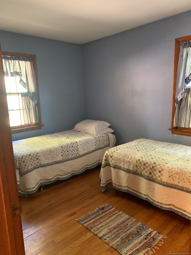 bedroom featuring wood-type flooring