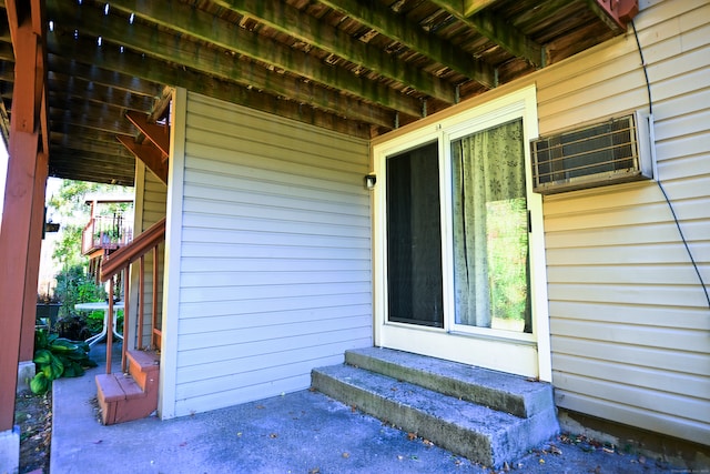 doorway to property featuring a patio area