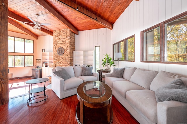 living room with vaulted ceiling with beams, dark hardwood / wood-style flooring, ceiling fan, and wood ceiling