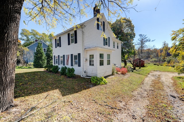 exterior space with a lawn