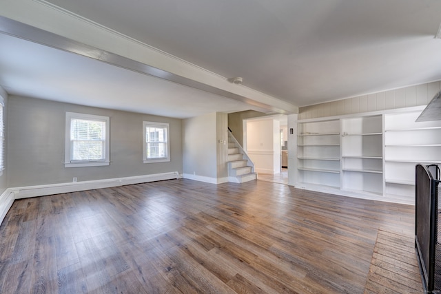 unfurnished living room featuring hardwood / wood-style floors