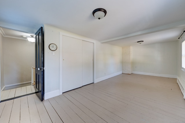 bonus room with light hardwood / wood-style floors