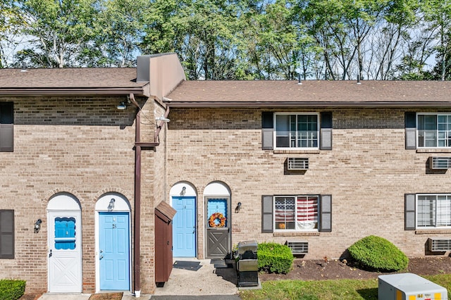 35 Mountain Village Rd Unit 8, Waterbury, CT 06706 - view of front of house with brick siding and roof with shingles