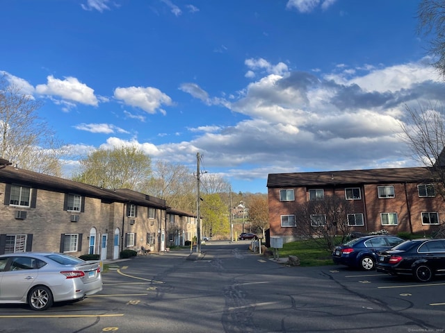 35 Mountain Village Rd Unit 8, Waterbury, CT 06706 - view of asphalt street with street lights and a residential view