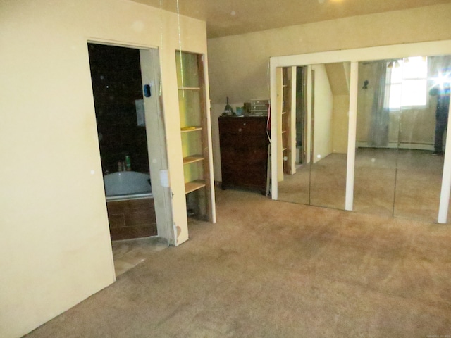 unfurnished bedroom with carpet flooring