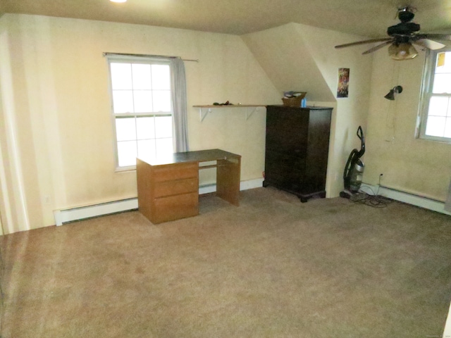 interior space with light carpet, vaulted ceiling, ceiling fan, and a baseboard heating unit