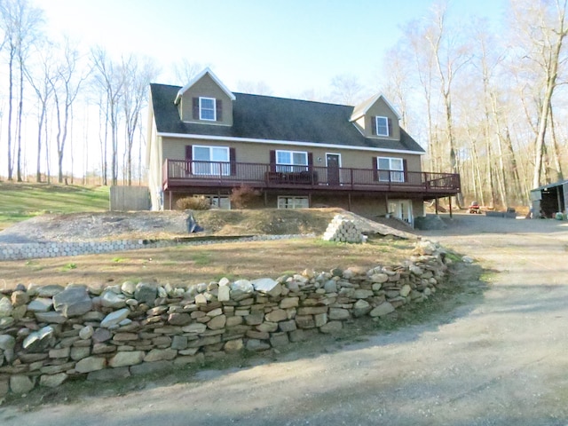 view of front of house featuring a wooden deck