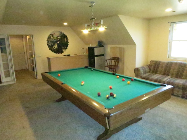 rec room with carpet, lofted ceiling, and pool table