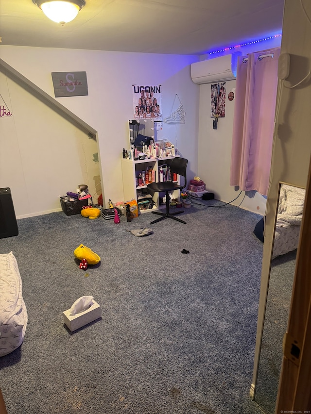 game room with an AC wall unit and carpet flooring