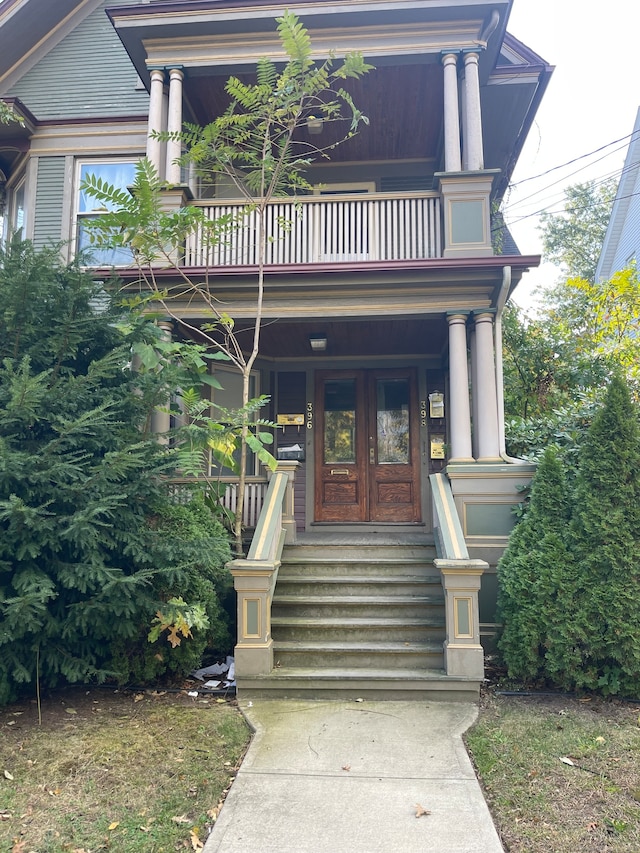 doorway to property with french doors and a balcony