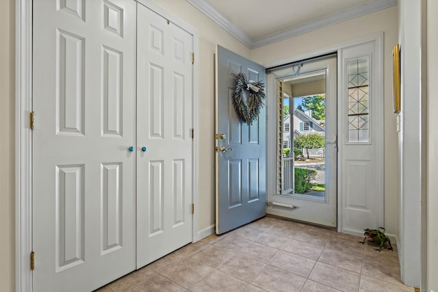 doorway to outside featuring light tile patterned floors and crown molding