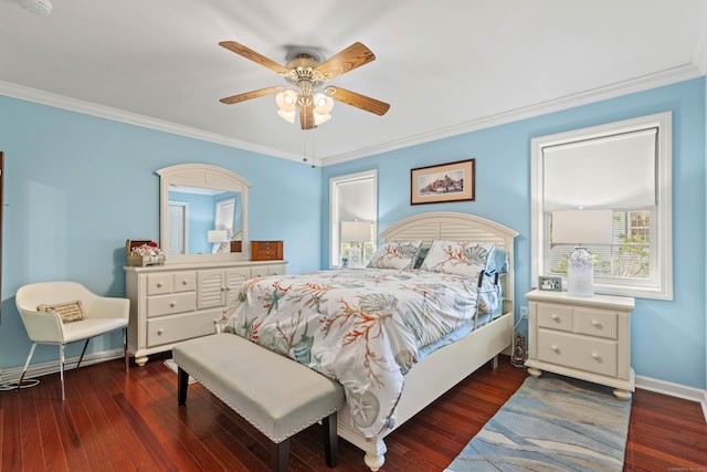 bedroom with ceiling fan, crown molding, and dark wood-type flooring