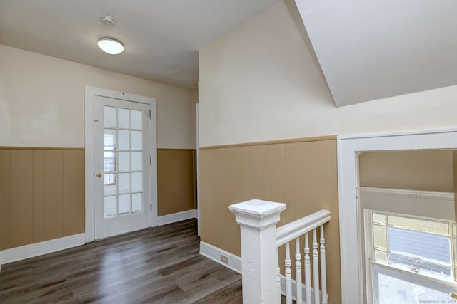 foyer entrance with dark hardwood / wood-style floors