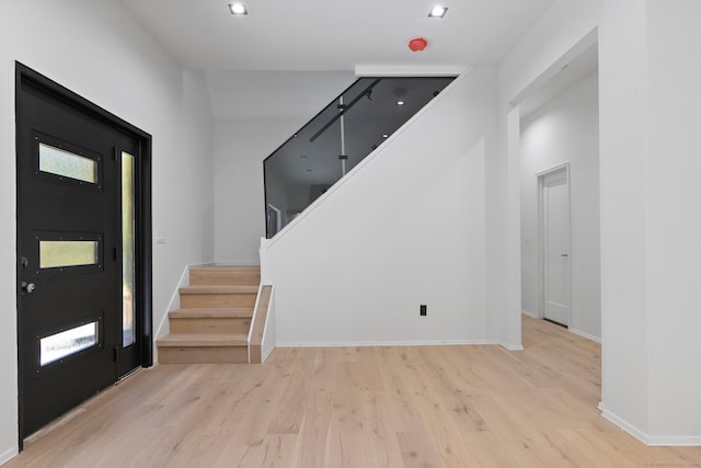 foyer with light hardwood / wood-style flooring