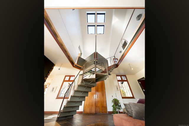 stairs with a towering ceiling