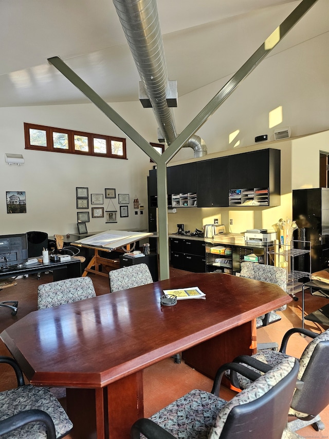 office featuring hardwood / wood-style floors and high vaulted ceiling