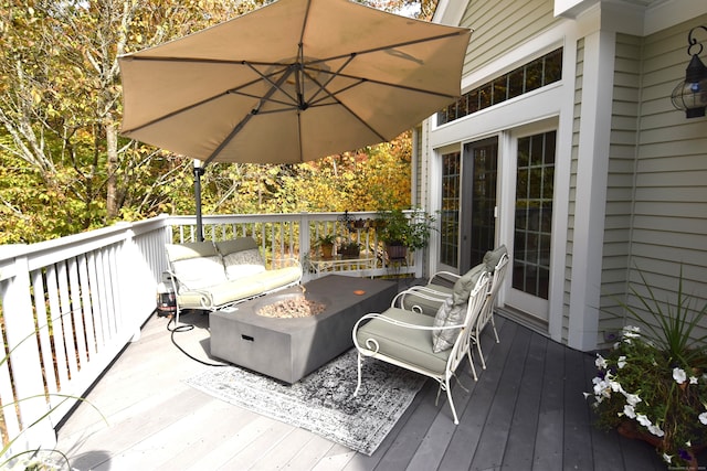 deck featuring a fire pit