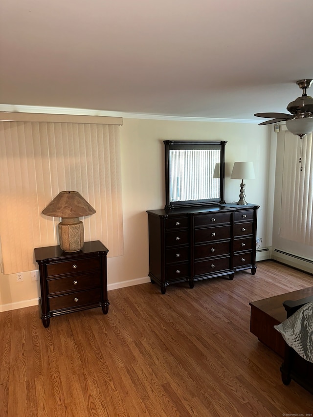 bedroom with hardwood / wood-style flooring and ceiling fan