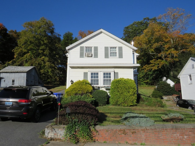 view of front of home with a front yard