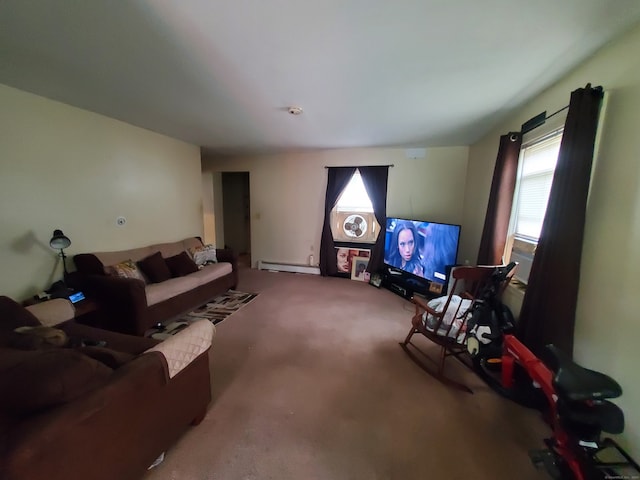 living room featuring a baseboard heating unit and carpet