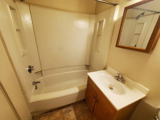 67 Enfield St Unit 37, Hartford, CT 06112 - full bathroom featuring vanity, shower / bathtub combination, and stone finish flooring