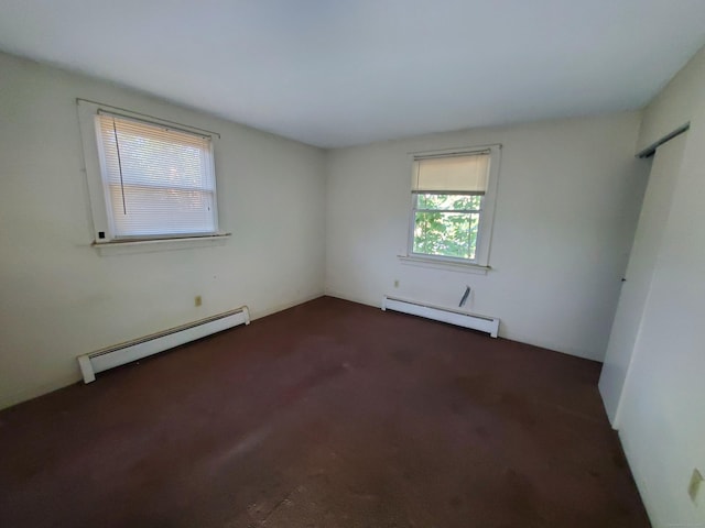 67 Enfield St Unit 37, Hartford, CT 06112 - unfurnished room with a baseboard heating unit and carpet floors