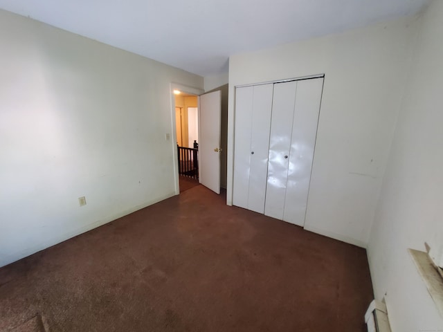 67 Enfield St Unit 37, Hartford, CT 06112 - unfurnished bedroom with carpet and a closet