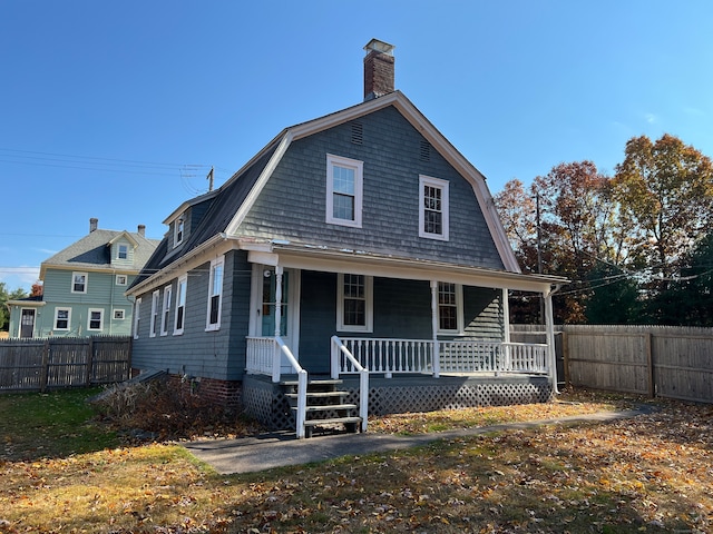 view of front of home featuring covered porch