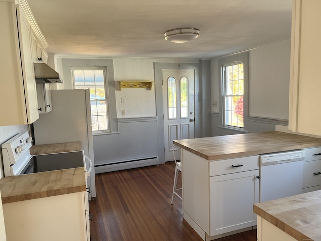 kitchen featuring white appliances, butcher block countertops, a baseboard heating unit, and exhaust hood