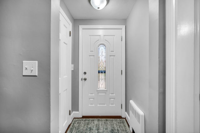 entryway featuring radiator heating unit