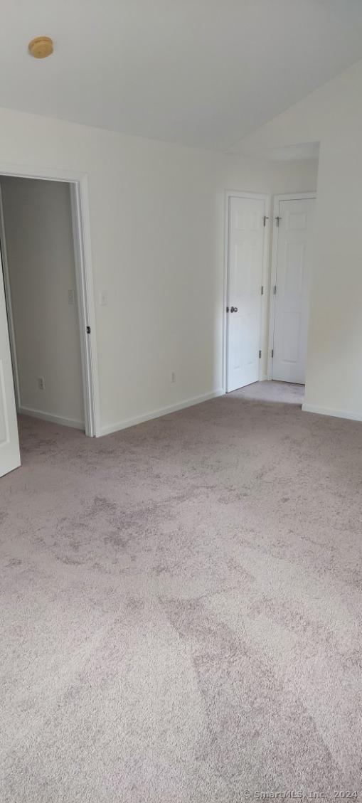 spare room with carpet flooring