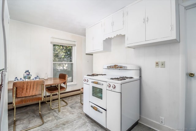 kitchen with a baseboard radiator, white gas stove, and white cabinetry