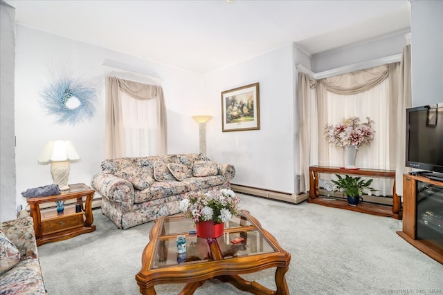 living room with carpet, ornamental molding, and a baseboard heating unit