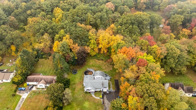 drone / aerial view with a view of trees