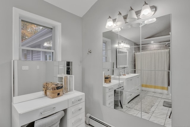 bathroom with marble finish floor, vanity, and walk in shower