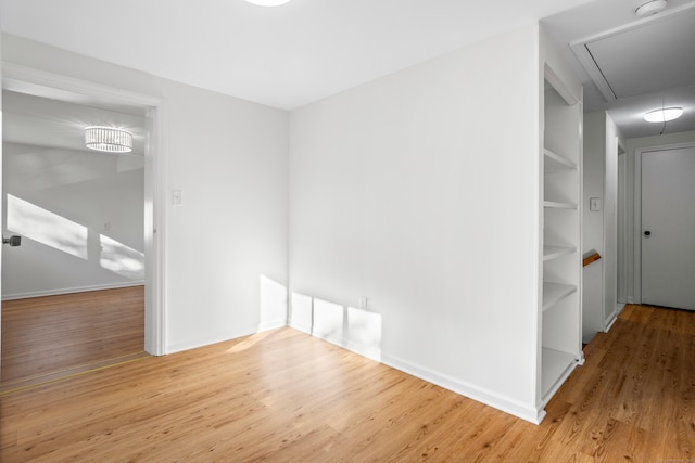 spare room featuring light hardwood / wood-style floors