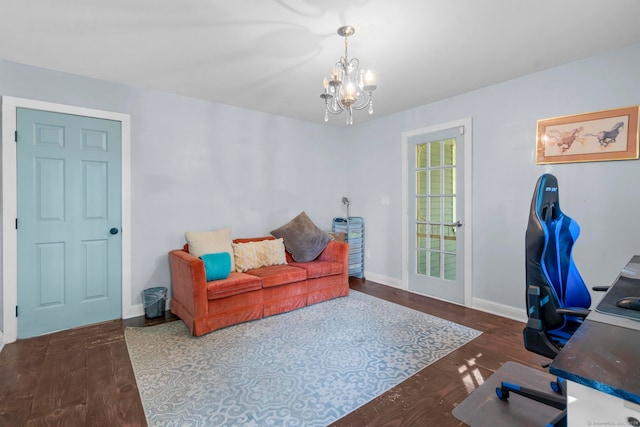 office area featuring dark hardwood / wood-style flooring and an inviting chandelier