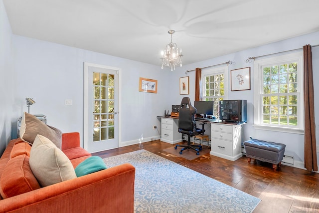 office space featuring a chandelier, a baseboard radiator, and dark hardwood / wood-style flooring