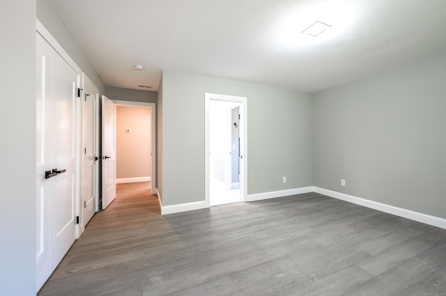 empty room featuring hardwood / wood-style floors