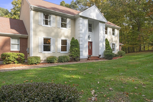 view of front of home with a front yard