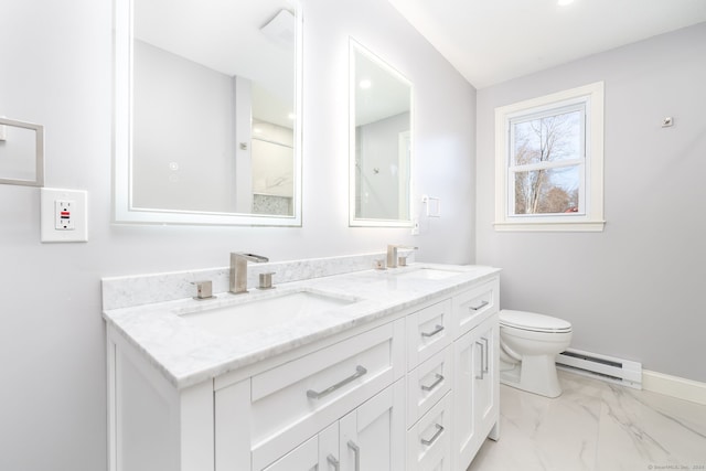 bathroom with vanity, toilet, and a baseboard radiator