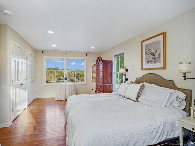201 Shore Rd, Greenwich, CT 06830 - bedroom featuring recessed lighting, baseboards, and wood finished floors