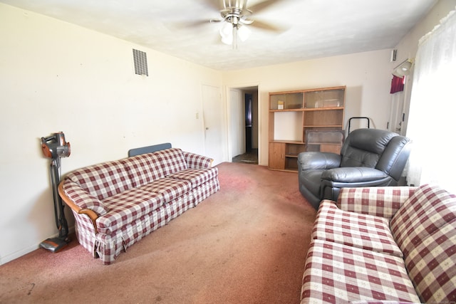 living room with carpet and ceiling fan