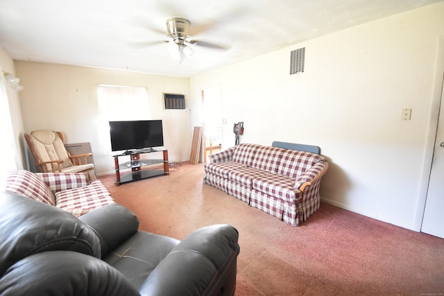 living room with ceiling fan and carpet floors