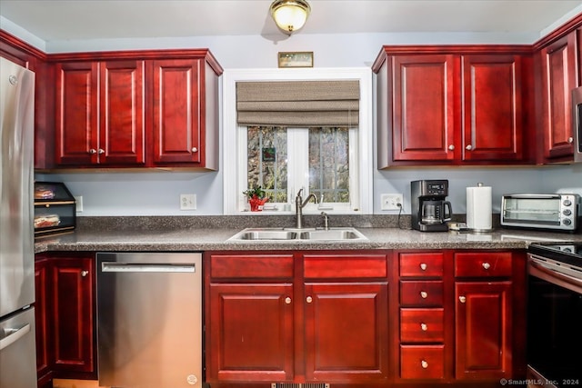 kitchen featuring stainless steel appliances and sink