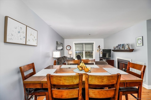 dining room with light wood-type flooring