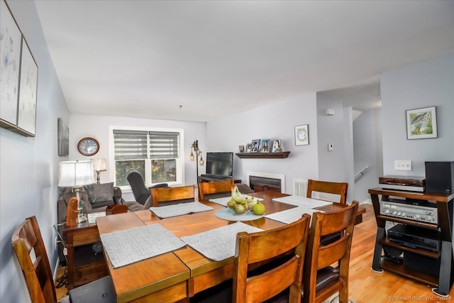 dining room with light wood-type flooring