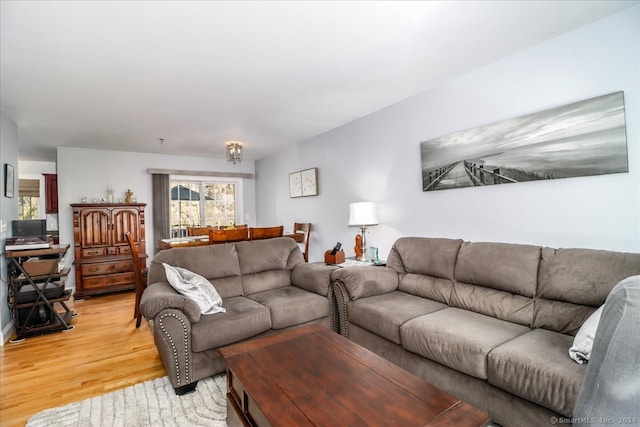 living room with light hardwood / wood-style flooring