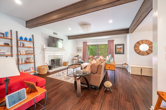 living room featuring a baseboard heating unit, beamed ceiling, and dark hardwood / wood-style flooring